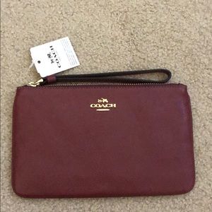 Brand new never used coach wristlet